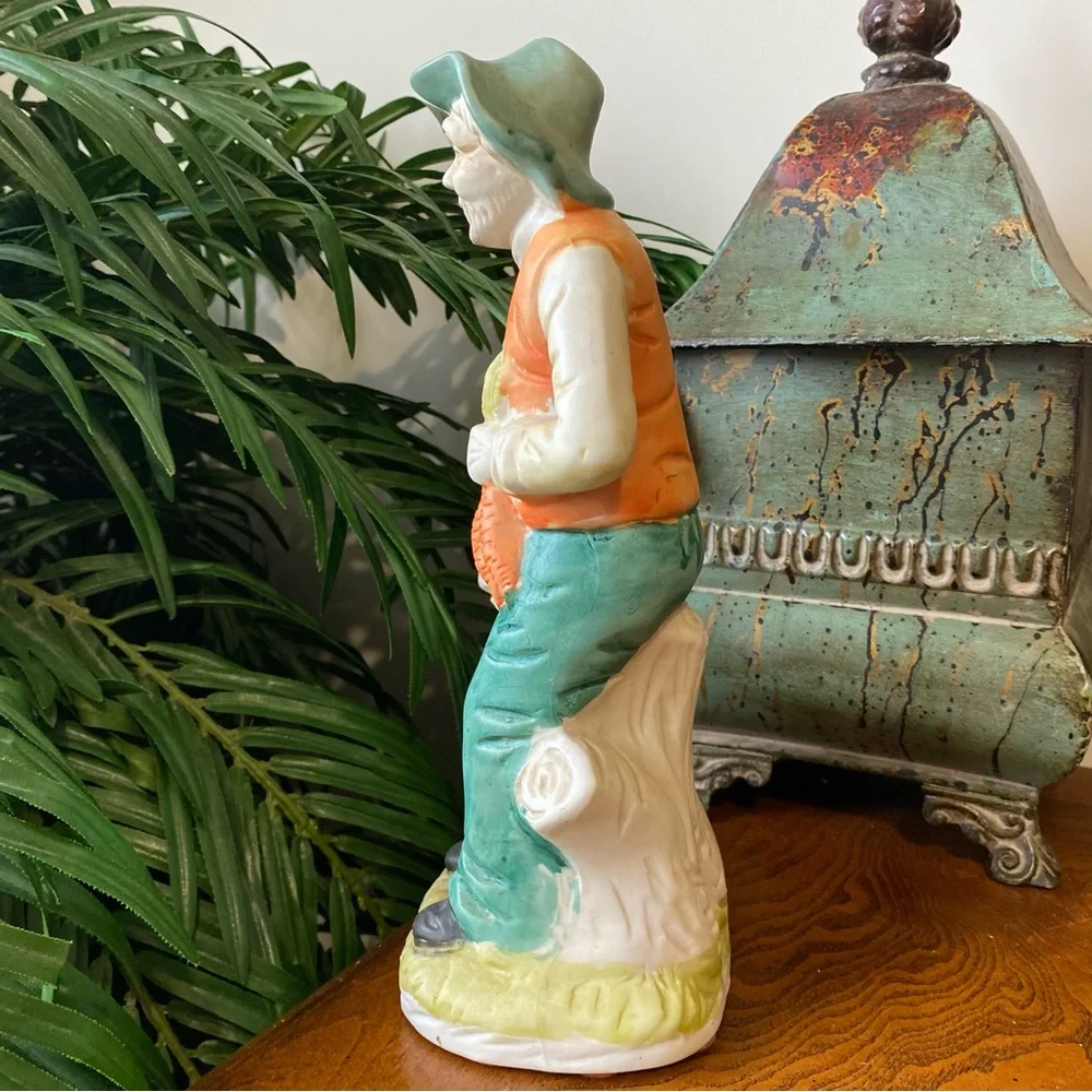 Vintage Ceramic Farmer Figurine in Green and Orange